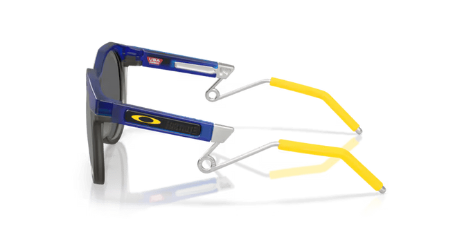 Sluneční brýle Oakley HSTN Metal Fortnite Battle Bus Frame/Prizm Sapphire Lenses