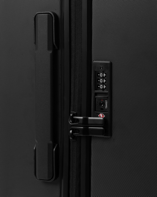 Cestovní kufr Db Ramverk Check-in Luggage Medium Black Out - 2025/26