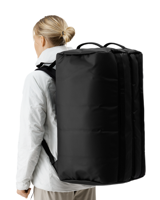 Taška DB Roamer Pro Split Duffel 90L Black Out - 2025/26