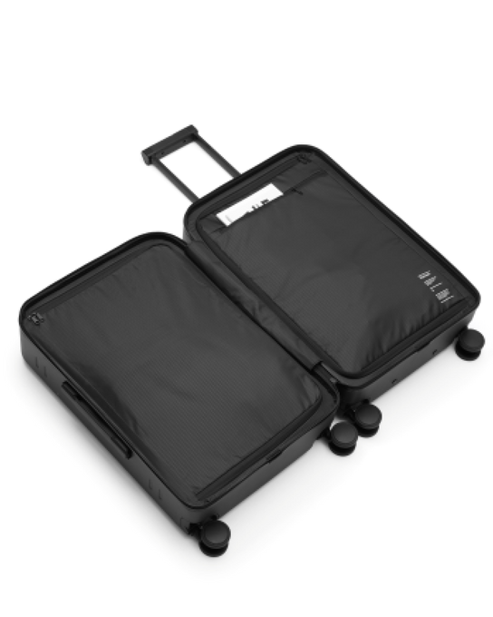 Cestovní kufr Db Ramverk Check-in Luggage Medium Black Out - 2025/26